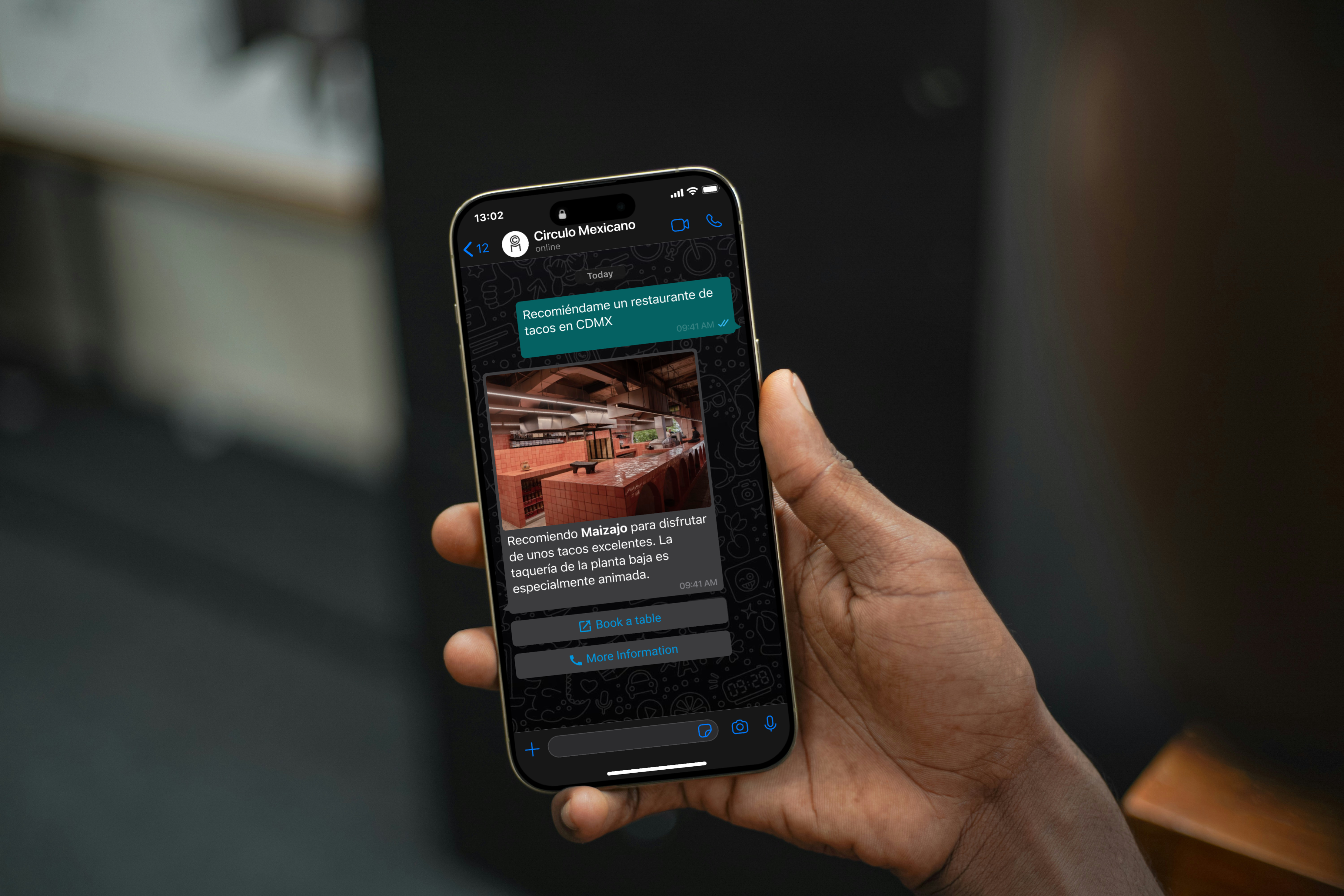 Hand holding phone with Aara hotel AI concierge on WhatsApp showing booking actions and in-chat buttons.